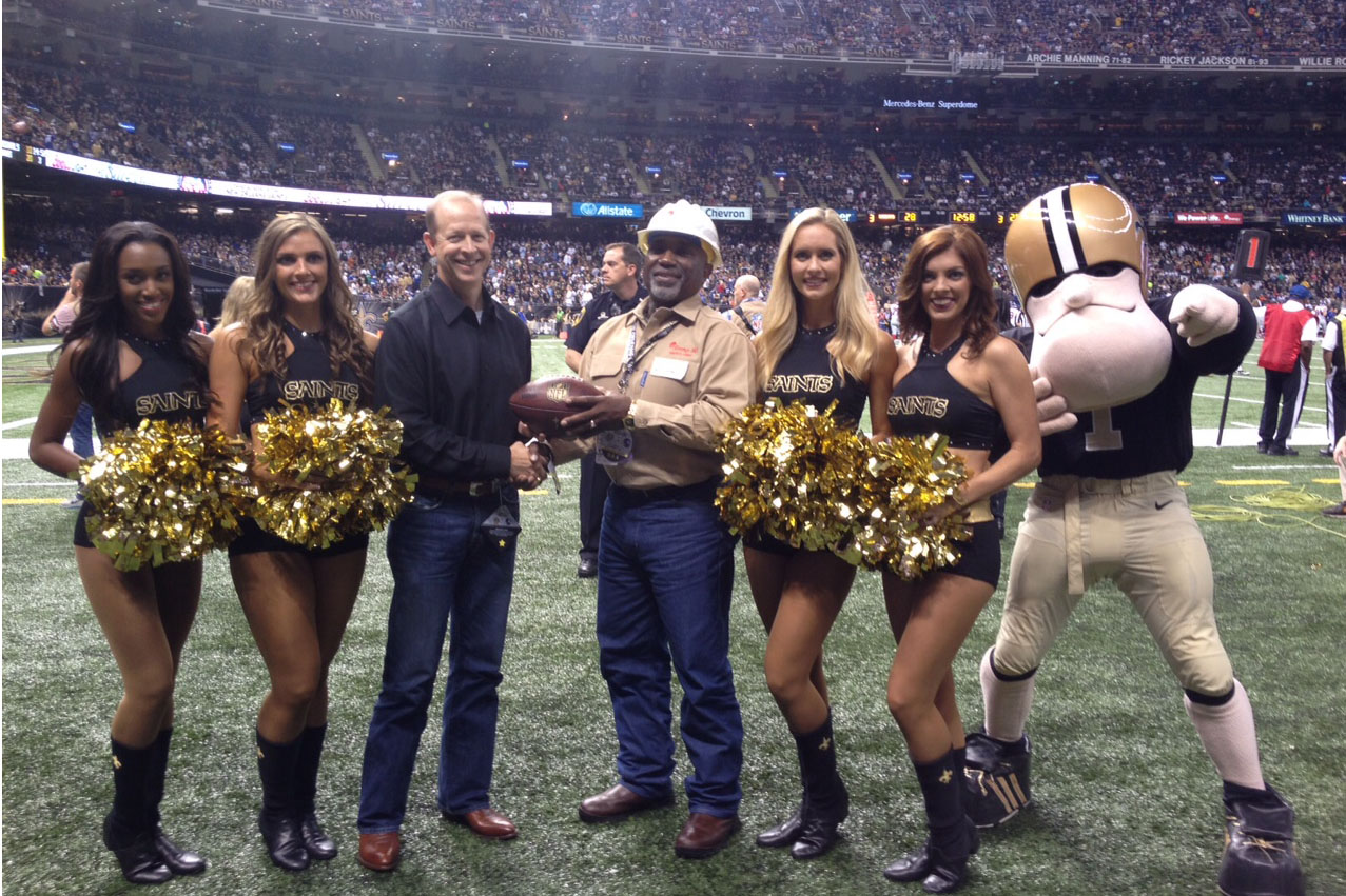Sir Saint and the Saintsations join Entergy Mississippi's Darron Case in congratulating Ray Vaughn, Lineman of the Game, for the Nov. 1 Saints-Giants game at the Superdome. Sir Saint and the Saintsations join Entergy Mississippi's Darron Case in congratulating Ray Vaughn, Lineman of the Game, for the Nov. 1 Saints-Giants game at the Superdome.